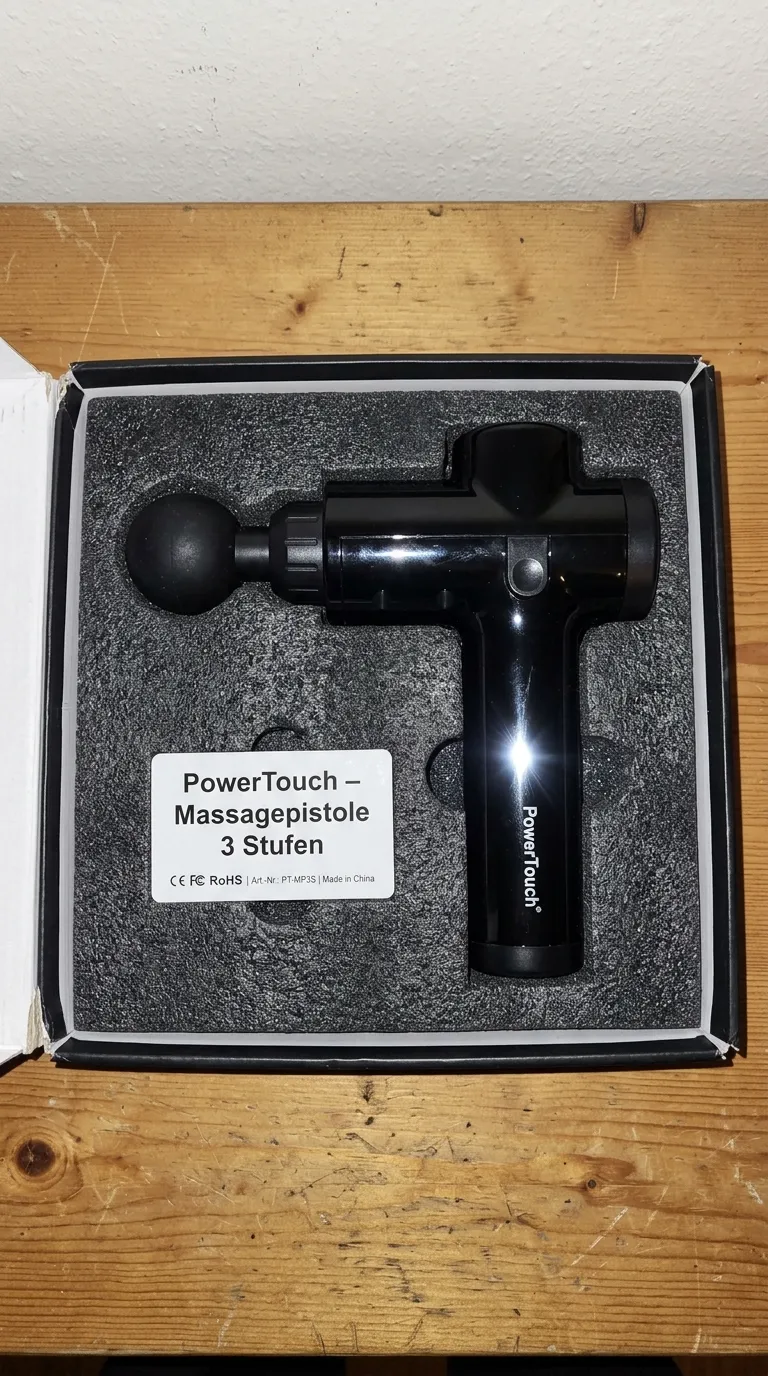 Kundenfoto PowerTouch Massagepistole – Smartphone-Aufnahme vor der Bearbeitung